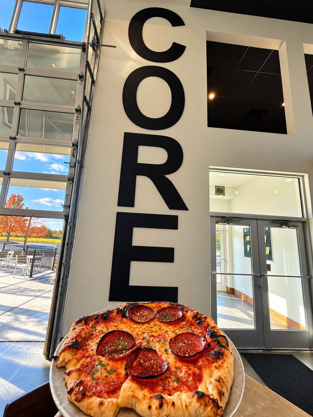 pepperoni-pizza-beneath- core-signage
